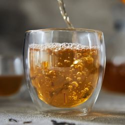 cup-with-bubbling-tea-pouring-from-a-teapot-on-a-g-2023-11-27-05-27-57-utc.jpg cup-with-bubbling-tea-pouring-from-a-teapot-on-a-g-2023-11-27-05-27-57-utc.jpg