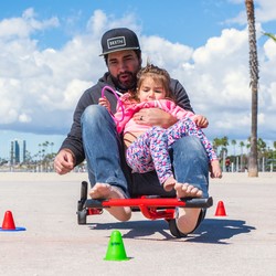811450-EzyRoller-Pro-X-Fun-Fahrzeug-Dreirad-fuer-Jugendliche-und-Erwachsene-Trike-ab-10-Jahre-Pro-X-Galeriebildvorlage-2000-x-2000-0000-pro-X-red-with-dad-and-daughter.jpg