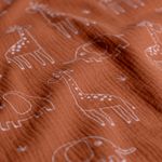 Mussola di cotone - Elefante e giraffa su legno di rosa