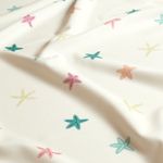 Tissu sport et maillot de bain - impression digitale étoiles de mer Ecru UPF50 recyclé