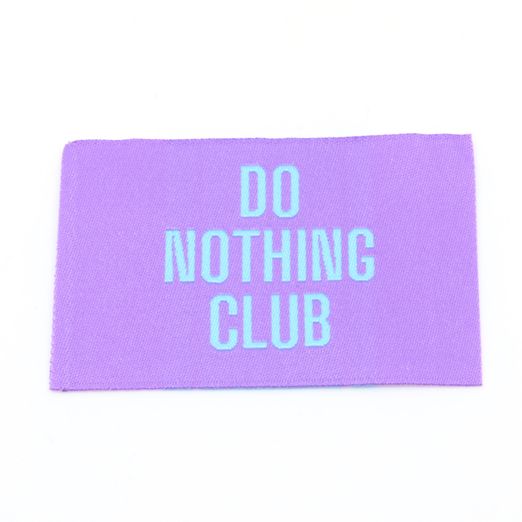 Webetikett - Do nothing! - Lila - 57 x 38mm Webetikett - Do nothing! - Lila - 57 x 38mm