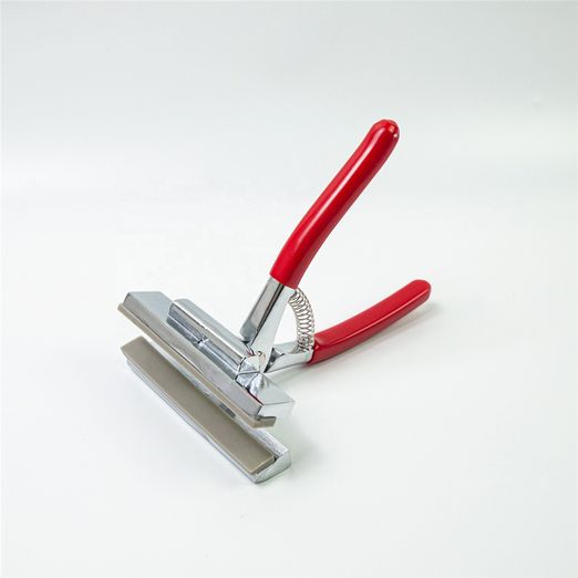 Pince de serrage pour toile canevas
