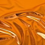Tissu déguisement - Jersey foil Lamé Uni Orange