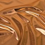 Tissu déguisement - Jersey foil Lamé Uni Bronze