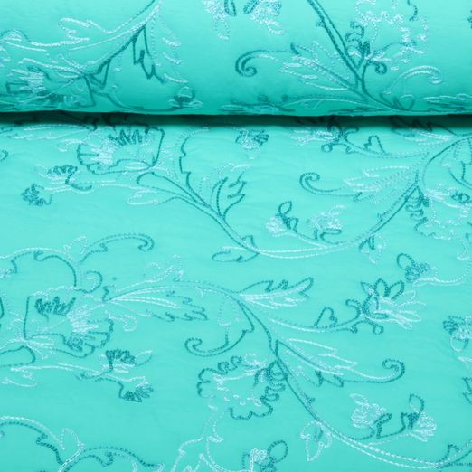 Tissu matelassé pour veste - Fleurs brodées Turquoise Tissu matelassé pour veste - Fleurs brodées Turquoise