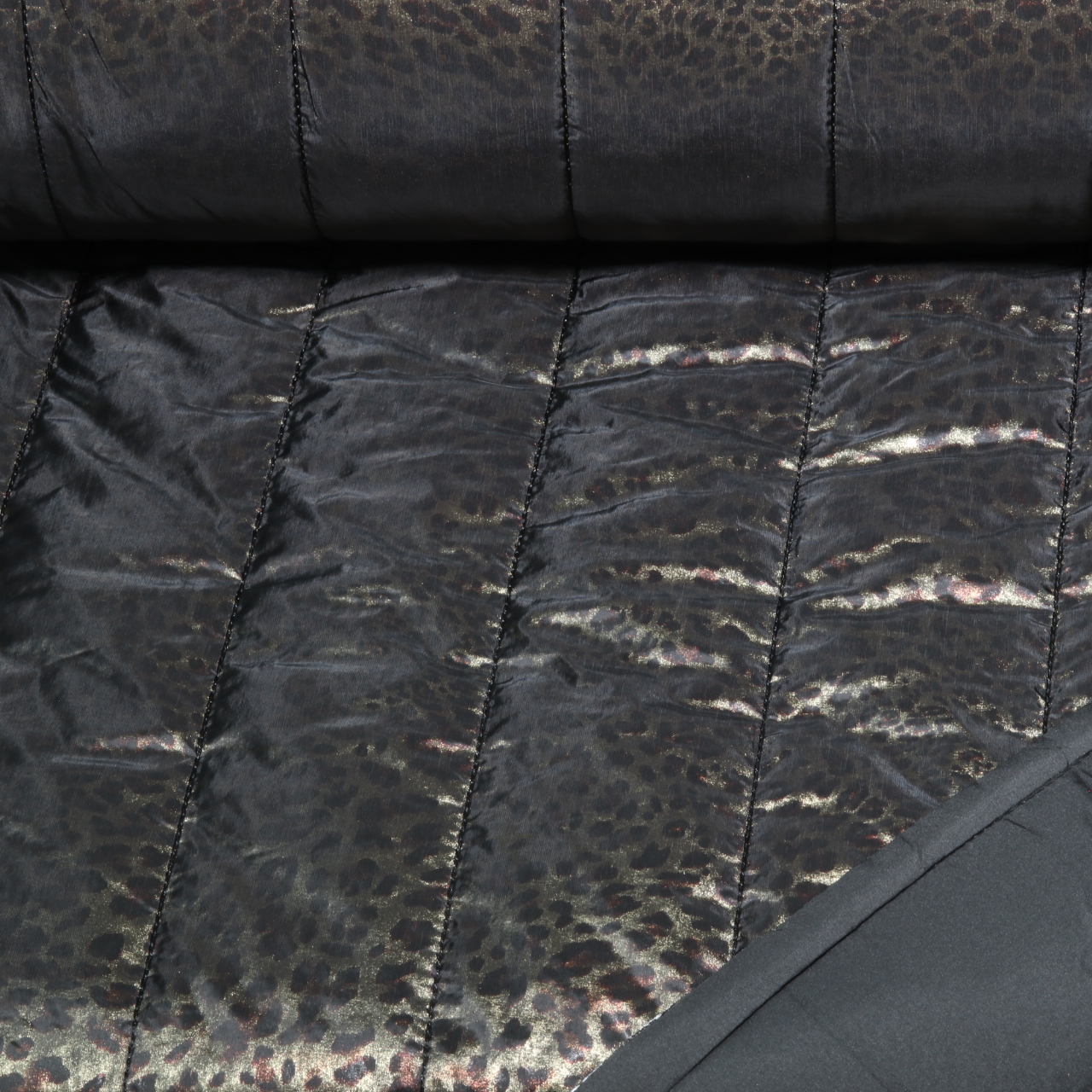 Tissu matelassé pour veste - Léopard noir et doré, avec impression sur film-0 Tissu matelassé pour veste - Léopard noir et doré, avec impression sur film-0