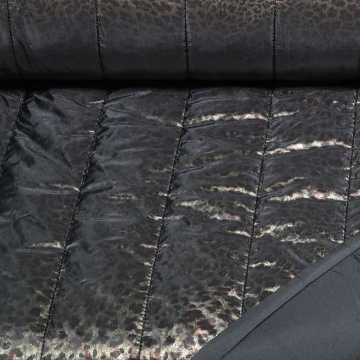 Tissu matelassé pour veste - Léopard noir et doré, avec impression sur film Tissu matelassé pour veste - Léopard noir et doré, avec impression sur film