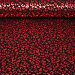 Jersey - Paillettes léopard noir et rouge, filmé, légèrement transparent Jersey - Paillettes léopard noir et rouge, filmé, légèrement transparent