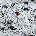 Popeline di cotone – Ragni di Halloween grigio chiaro