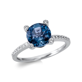 Ring aus 750 Weißgold Topas 2,19ct London Blue 36 Diamanten 0,22ct TW-SI Ø8,4mm