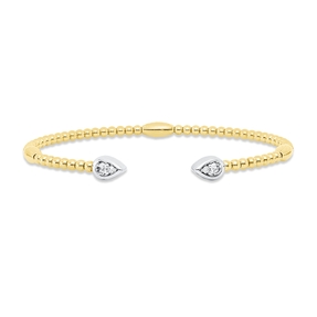 Armreif aus 585 Gold gelb/weiß 4 Diamanten 0,2ct TW-PI 46x57mm