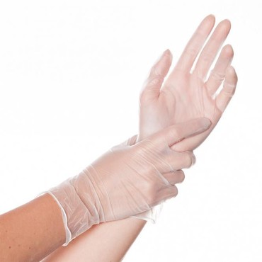 Hände in durchsichtigen Vinylhandschuhen, eine Hand greift über die andere Hände in durchsichtigen Vinylhandschuhen, eine Hand greift über die andere