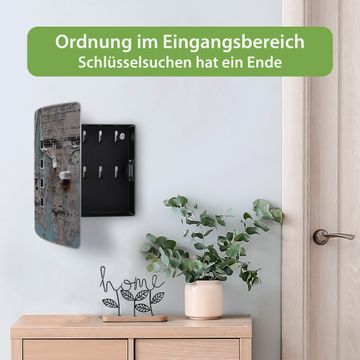 Schlüsselkasten Motiv Wand mit Zeitungen