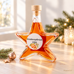 Weinbergpfirsich Likör Sternflasche Weihnachtsflasche im festlichen Ambiente – Geschenkidee Sternflasche Weihnachtsflasche mit fruchtig-weichem Weinbergpfirsich Likör in weihnachtlicher Deko-Szene mit reifen Pfirsichen und Pfirsichblüten – perfekt als Adventsgeschenk, Mitbringsel oder Firmenpräsent