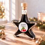 Balsamico Himbeer Sternflasche Feinkost-Geschenkflasche im festlichen Ambiente – Geschenkidee Sternflasche Feinkost-Geschenkflasche mit fruchtigem Himbeer-Balsamessig (3% Säure) in weihnachtlicher Deko-Szene mit frischen Himbeeren und Minzblättern – perfekt als Feinkost-Geschenk, Mitbringsel oder Firmenpräsent für Genießer