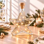 Leere Sternflasche als Tischdeko mit Lichterkette – weihnachtliche Deko-Idee Leere Sternflasche aus Klarglas, dekoriert mit warmweißer Lichterkette, als stimmungsvolle Tischdeko zu Weihnachten und im Advent
