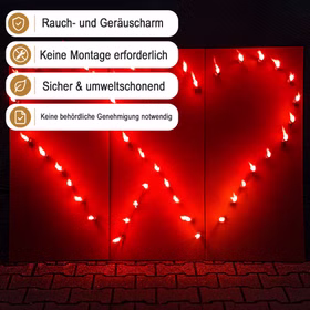 Lichterbild Brennendes rotes Doppelherz mit Hinweis-Bannern zu raucharmem und genehmigungsfreiem Einsatz.