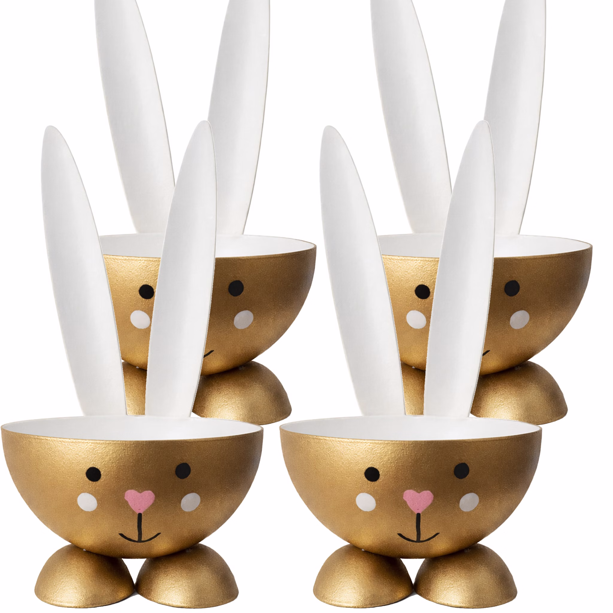 Vier goldene Eierbecher in Hasenform aus Metall nebeneinander auf weißem Hintergrund.
