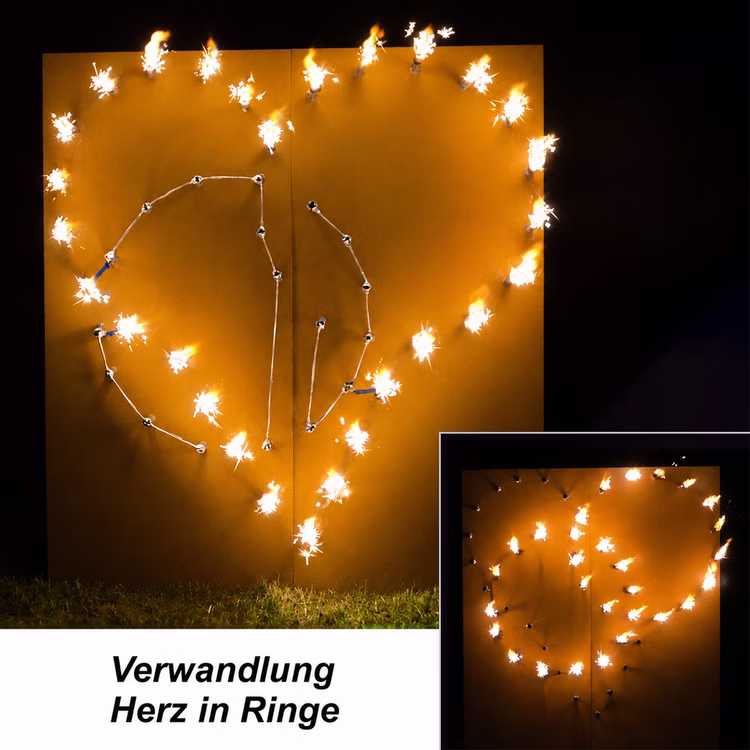 HERZ wird zu Ringen Brennendes Herz Lichterbilder Feuerwerk Hochzeit Feuerbilder Heiratsantrag Lichterbild HERZ wird zu Ringen Verwandlungsbild.