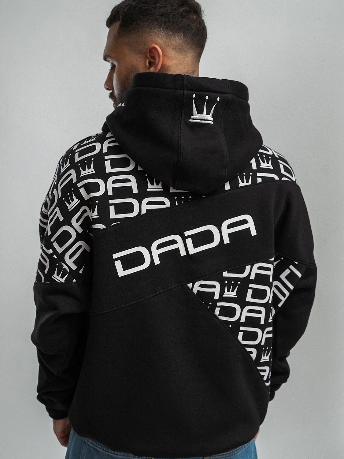 Oversize Hoodie mit Allover Logo Druck und Kapuze Oversize Hoodie mit Allover Logo Druck und Kapuze