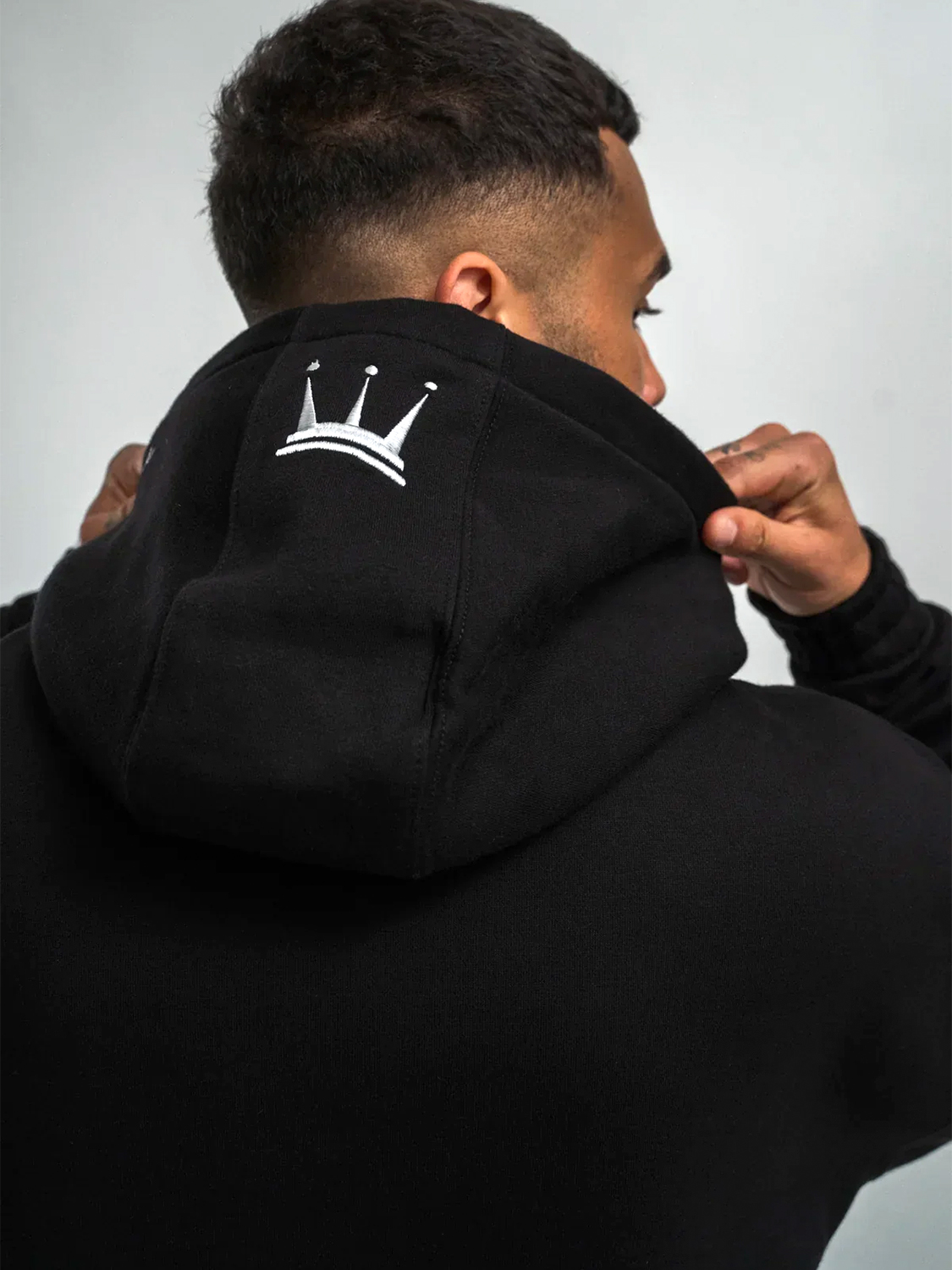 Oversize Hoodie mit Frottee Logo und Zip-Tasche am Ärmel Oversize Hoodie mit Frottee Logo und Zip-Tasche am Ärmel