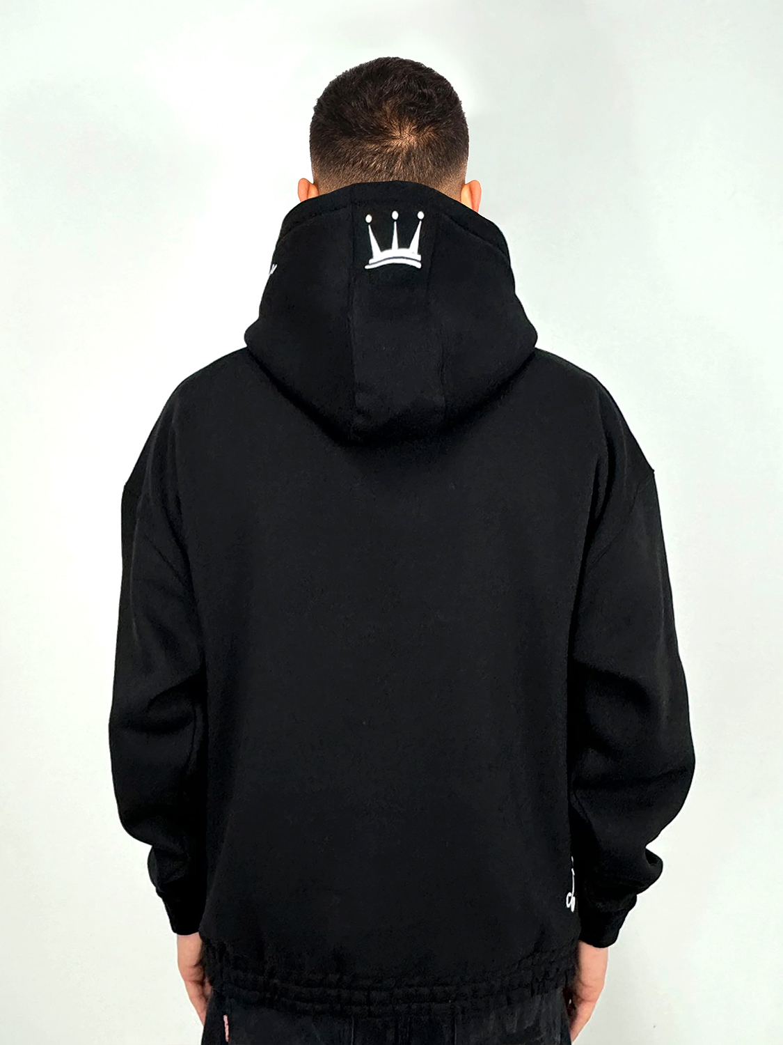 Oversize Hoodie mit Frottee Logo und Zip-Tasche am Ärmel Oversize Hoodie mit Frottee Logo und Zip-Tasche am Ärmel