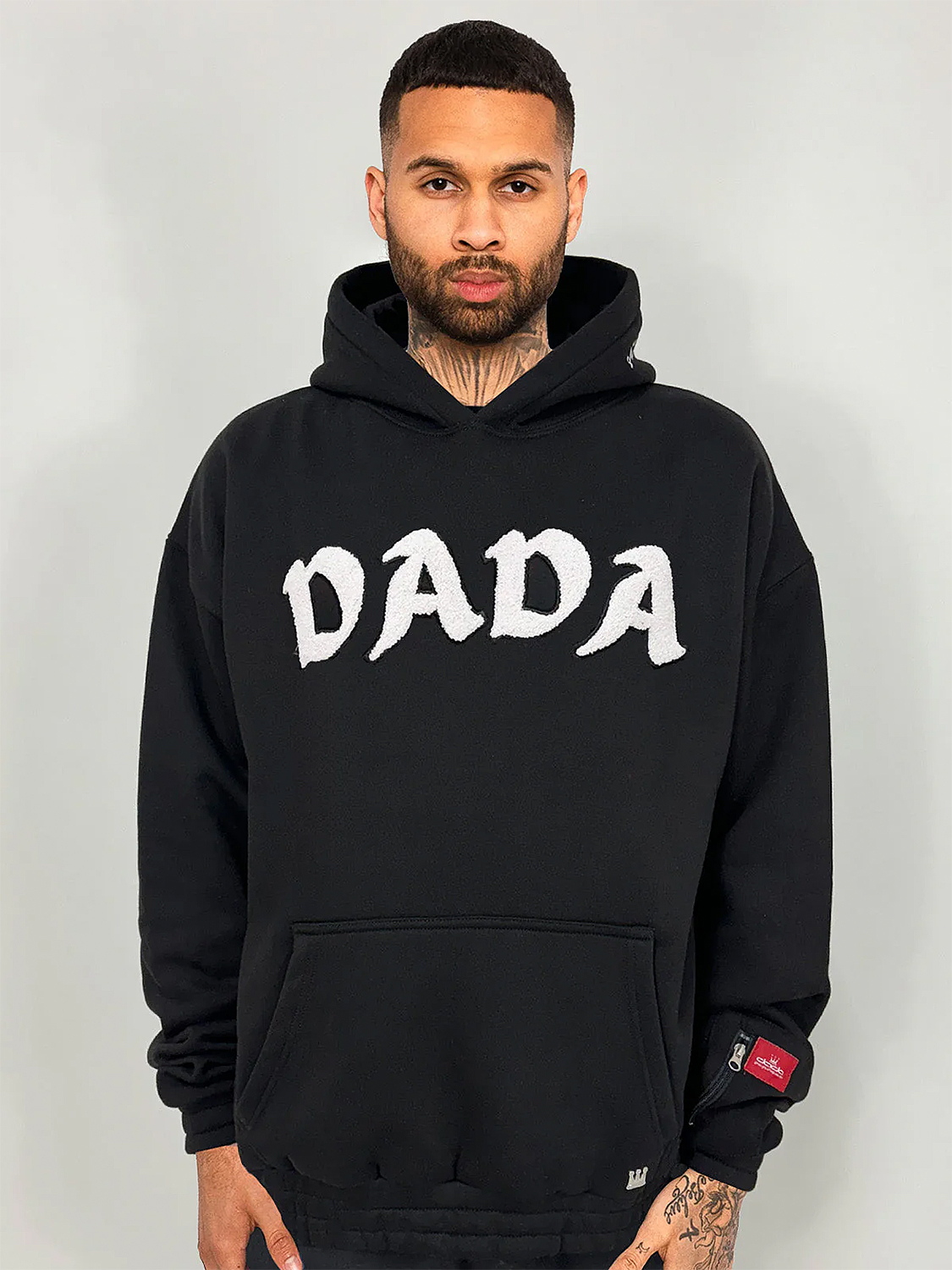 Oversize Hoodie mit Frottee Logo und Zip-Tasche am Ärmel Oversize Hoodie mit Frottee Logo und Zip-Tasche am Ärmel