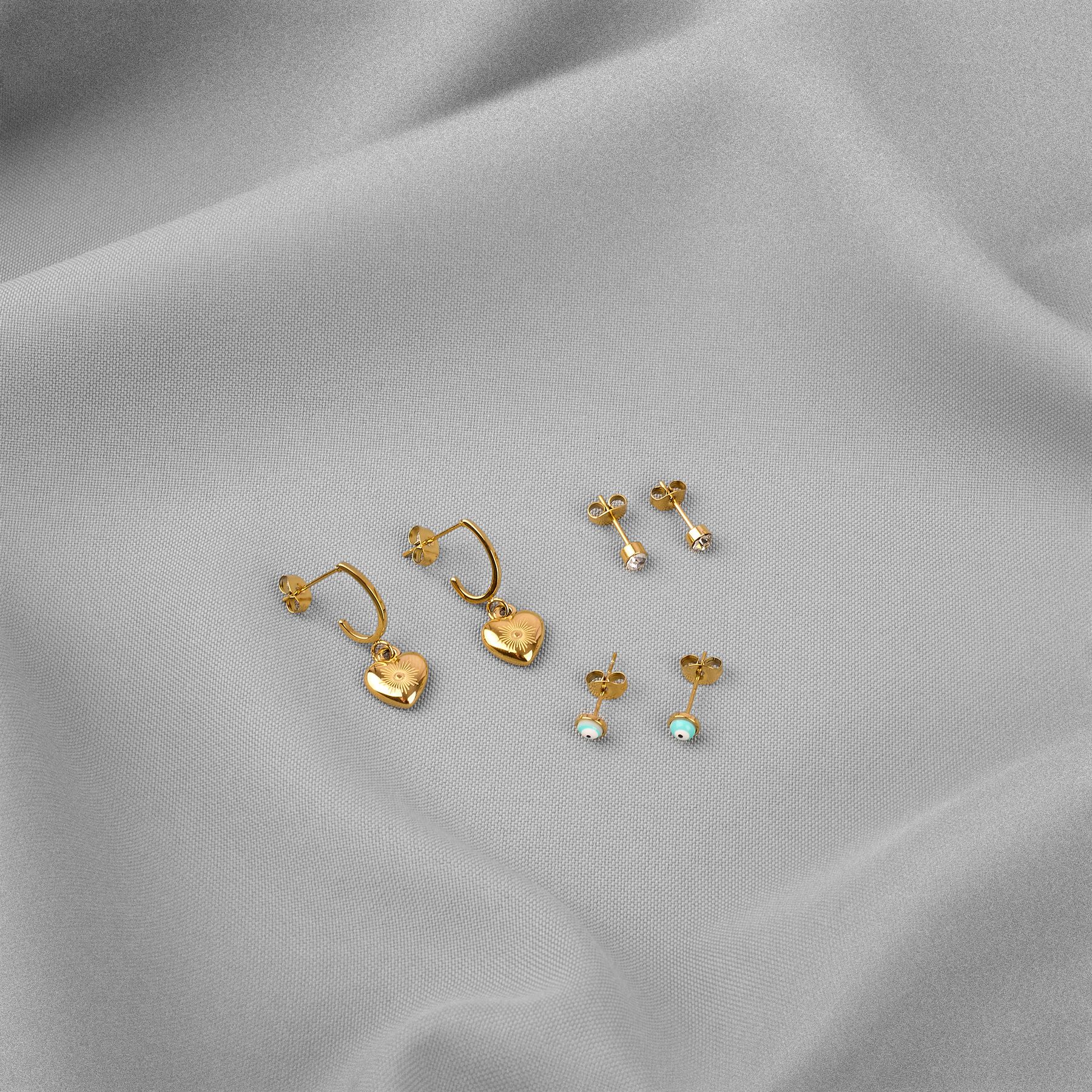 Ohrschmuck Set mit Herzanhänger und Evil Eye Ohrschmuck Set mit Herzanhänger und Evil Eye
