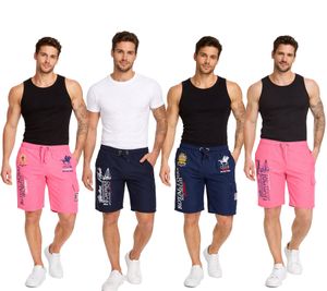 GEOGRAPHICAL NORWAY Quara/Quoyal Costume da bagno da uomo Pantaloncini da bagno con stampa logo Pantaloncini da bagno con tasche Pantaloncini da bagno Blu navy/Rosa