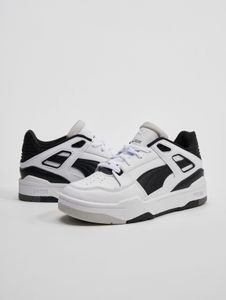 Baskets Puma unisexes sportives blanches et noires