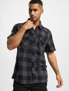 Versatile Brandit men's polo shirt with pockets, cotton, black