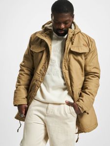 Veste fonctionnelle Brandit pour homme, beige, avec cordon de serrage et fermeture éclair.