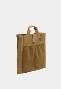 Sujetador unisex Soft Brandit con cierre de velcro y bolsillos, color beige.