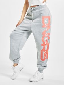 Pantalones versátiles Dangerous DNGRS para mujer con cordón ajustable y bolsillos, confeccionados en algodón, color gris.