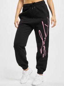 Pantalon pour femme Modern Dangerous DNGRS, en coton noir, avec cordon de serrage et poches.