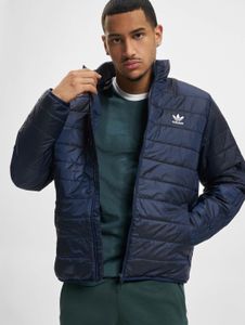 Chaqueta funcional Adidas para hombre con cremalleras y bolsillos, color azul.