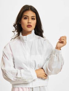Veste adidas moderne pour femme, blanche, avec fermetures éclair et poches.