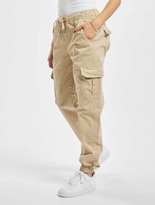 Vaqueros elásticos de mujer Casual Urban Classics con bolsillos con cremallera, de algodón, color beige.