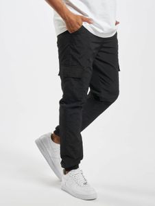 Pantalones cómodos para hombre URBAN CLASSICS con bolsillos con cremallera, 130 g/m², color negro.