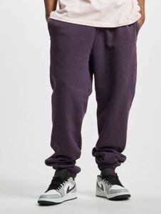 Versatile URBAN CLASSICS men's trousers with drawstring and pockets, 460 g/m² cotton, violet