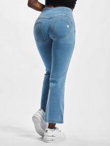 Jean Freddy confortable pour femme, en coton bleu, avec poches zippées.
