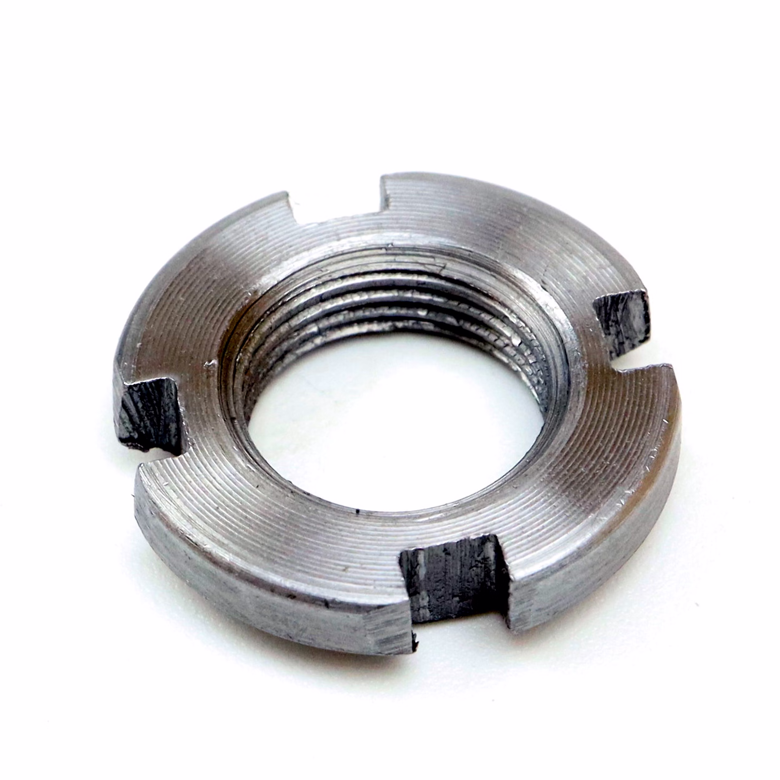 Tuerca deslizante KM0 10x18x4mm según DIN 981 PP190001 La contratuerca se utiliza para fijar conexiones eje-cubo, por ejemplo, una rueda dentada en un eje, aplicando presión axial.