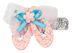 Eine dekorative Haarspange mit rosa Glitzersandalen 1