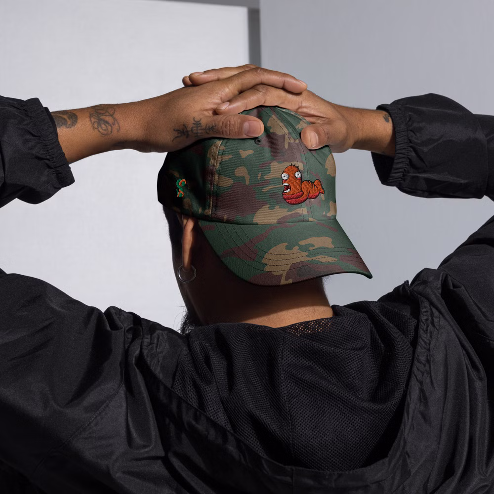 classic-dad-hat-green-camo-front-63e516c1e2a12.jpg