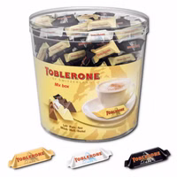 Toblerone Tiny Mix, Mini Schokoladen-Riegel, 904g Dose Toblerone Tiny Mix, Mini Schokoladen-Riegel, 904g Dose Bild 1