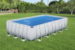 Solar Poolabdeckung 703 x 336 cm im Garten