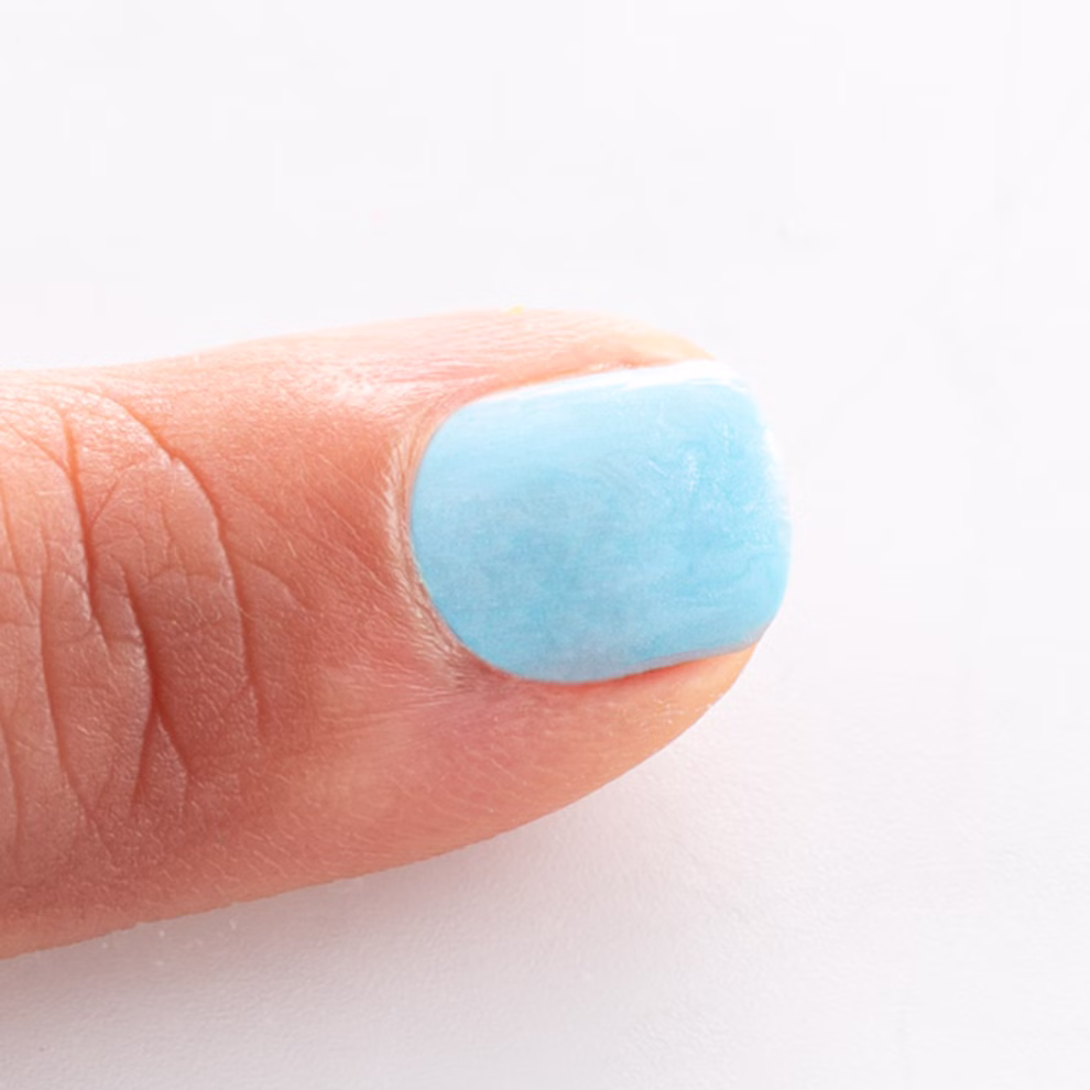 Water-based nail varnish light blue Water-based nail varnish light blue
