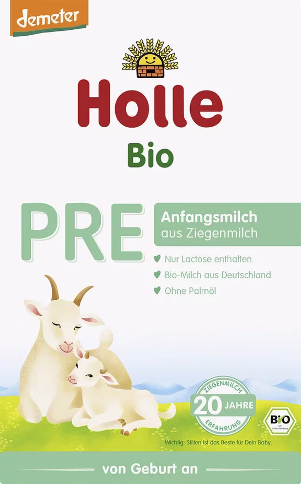 Holle Holle Bio-Anfangsmilch PRE aus Ziegenmilch von Geburt an_21189 Vorderseite einer Packung der Holle Bio-Anfangsmilch PRE aus Ziegenmilch von Geburt an mit weißen Ziegen grüner und hellgrüner Schrift und deutschen Produktangaben wie "von Geburt an".
