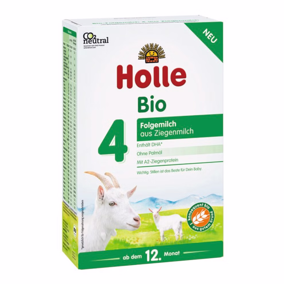 Holle Bio-Folgemilch 4 aus Ziegenmilch ab dem 12. Monat_21187 Eine Schachtel Holle Bio-Folgemilch 4 aus Ziegenmilch ab dem 12. Monat eine Folgemilch aus Ziegenmilch für Babys ab dem 12. Monat in grün-weißer Verpackung mit Ziegen und Produktangaben auf Deutsch.