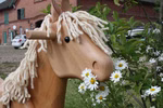 Alegre caballito balancín